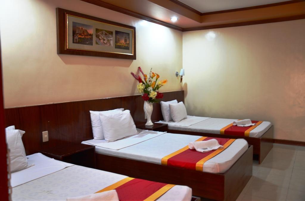 Ysabelle Mansion Panzió Puerto Princesa Szoba fotó