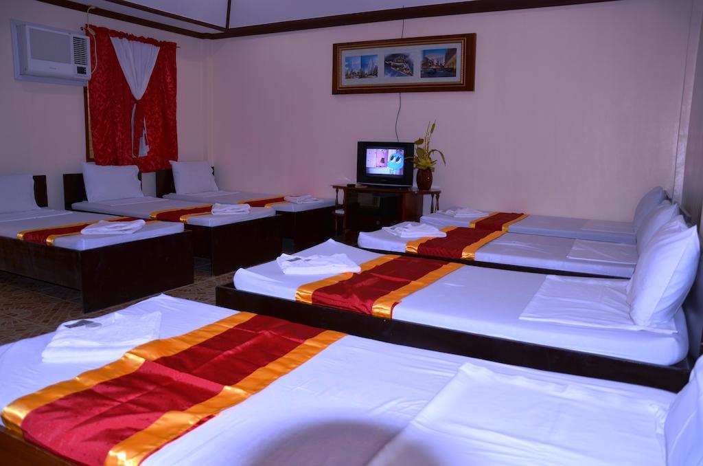 Ysabelle Mansion Panzió Puerto Princesa Szoba fotó