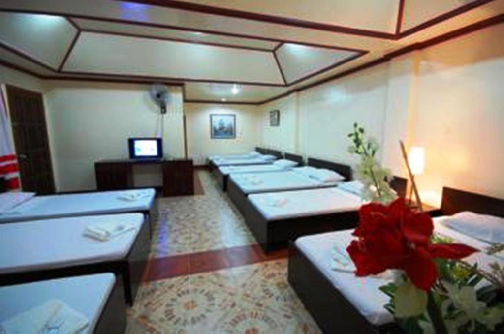 Ysabelle Mansion Panzió Puerto Princesa Szoba fotó